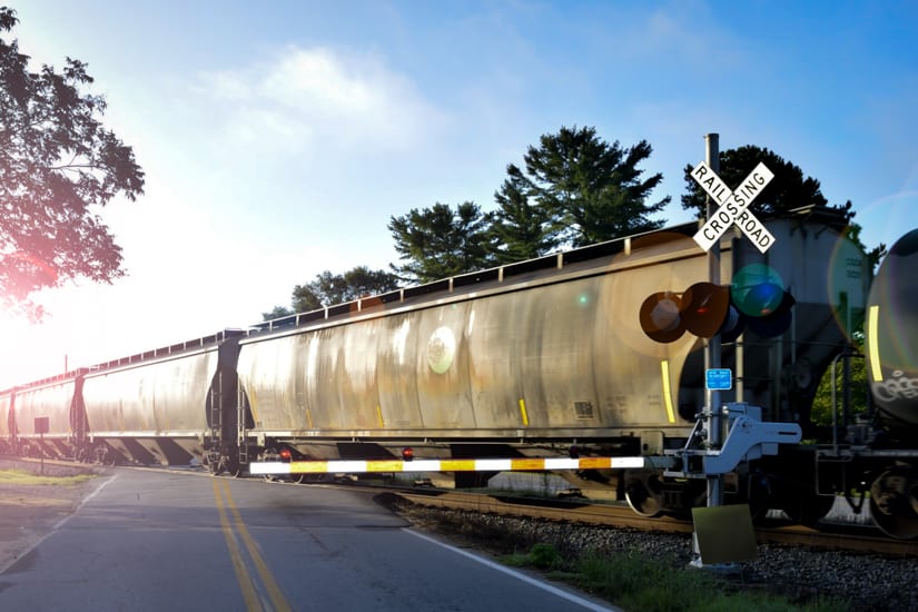 Train Crossing At Railroad Tracks