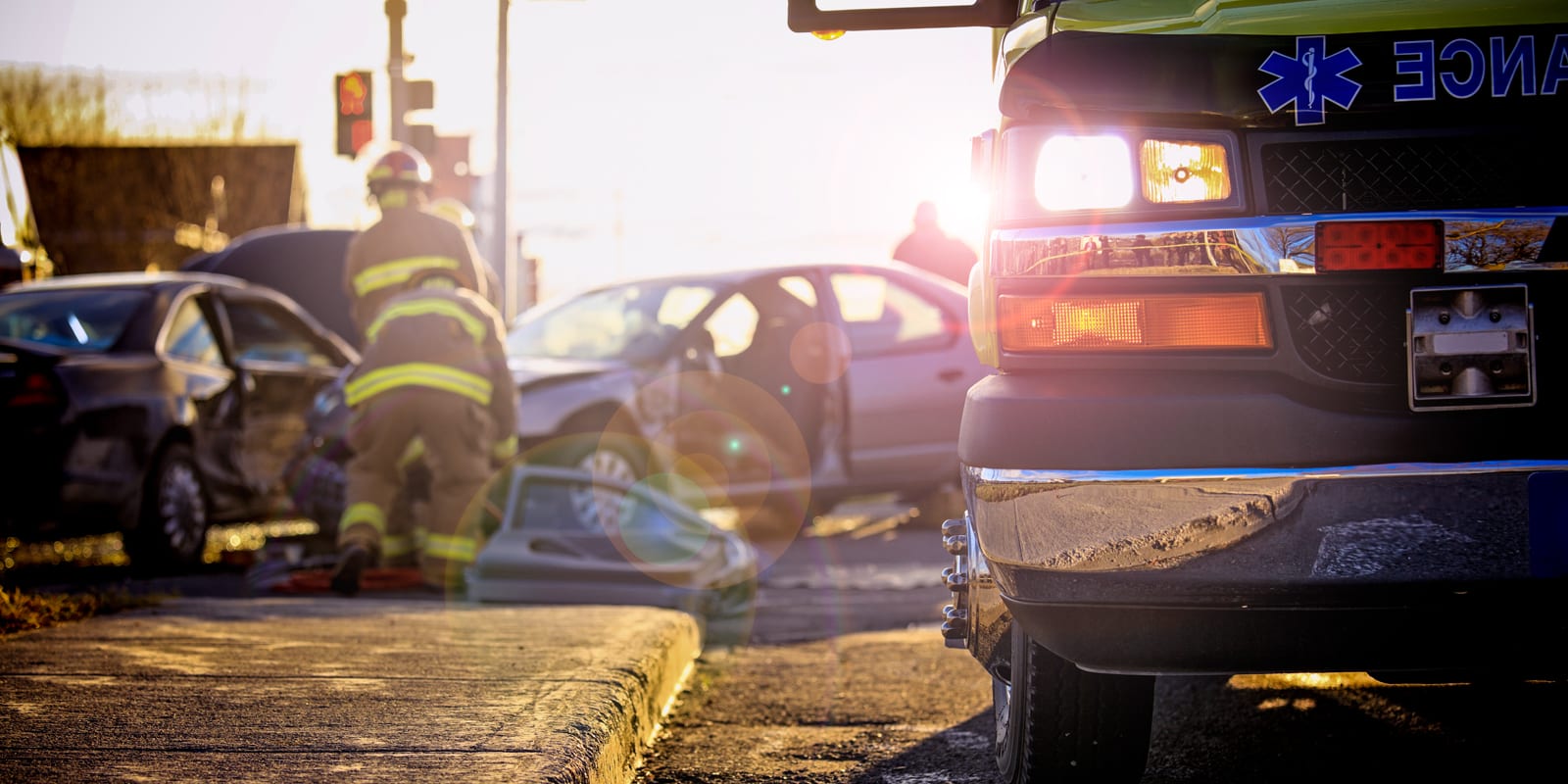 First Responders on Seen Assisting the Injured After a Car Accident