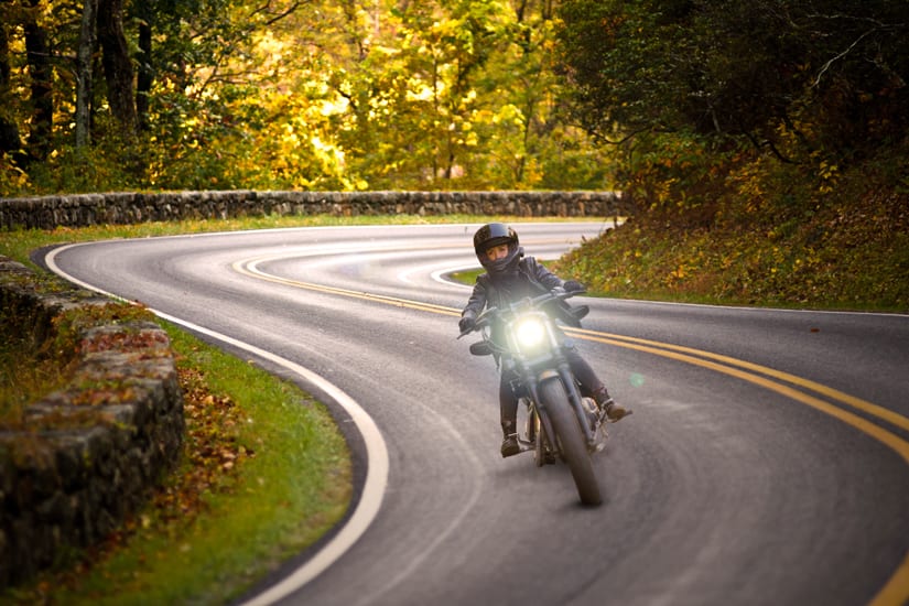 Motorcyclist Riding Motorcycle