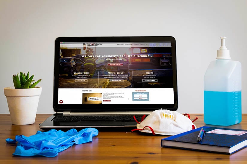 laptop with PPE Equipment