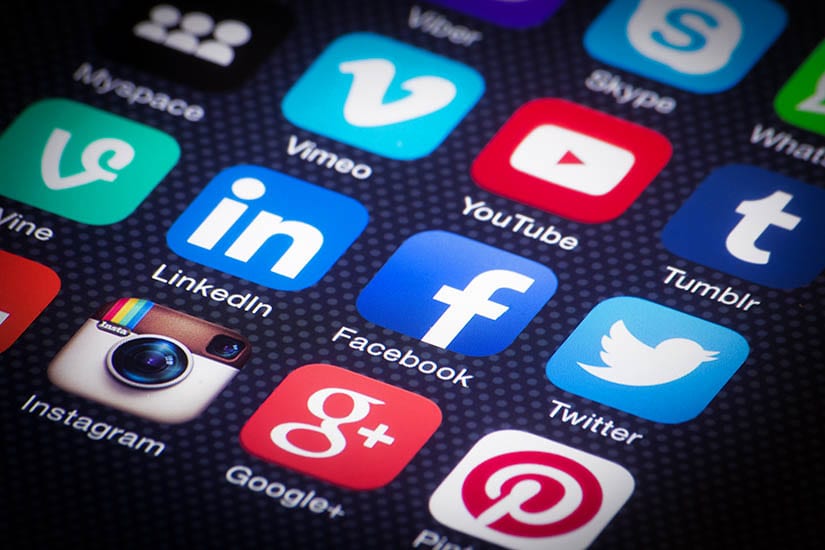 Phone screen with social media icons